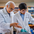 Student doctor Mahan Hadjian collaborates with Dr. Baki Agbas in the lab